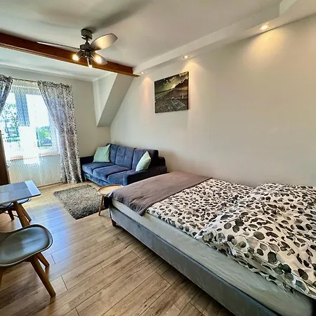 Maison d'hôtes Pod Papugami - Komfortowe Z Widokiem Na Rzeke Łeba